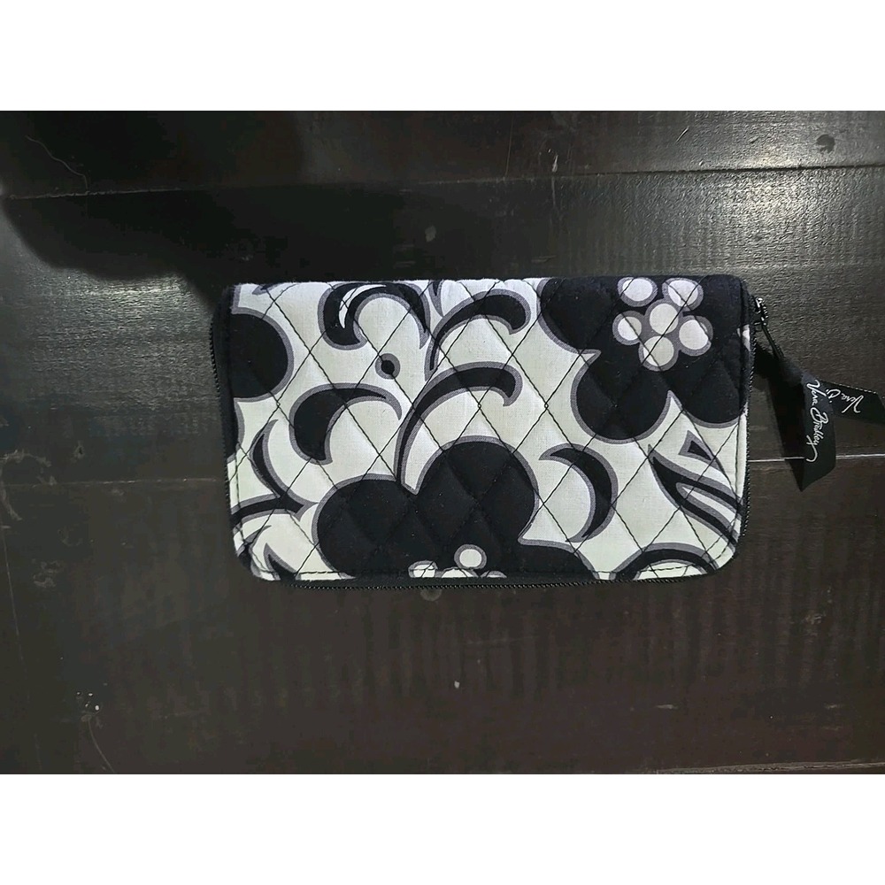 Vera Bradley zip-around wallet in the retired "Night and Day" pattern